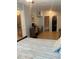 Spacious bedroom with tile floors, neutral walls, ceiling fan, and closet at 1485 Gainsville Dr, Deltona, FL 32725