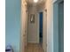 Hallway featuring neutral walls, and tile flooring at 1485 Gainsville Dr, Deltona, FL 32725