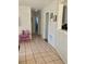 Hallway featuring neutral walls and tile flooring at 1485 Gainsville Dr, Deltona, FL 32725