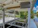View of covered boat lift and waterfront at 1520 Stone Trl, Enterprise, FL 32725