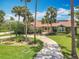 Beautiful home with mature landscaping and a winding driveway at 1520 Stone Trl, Enterprise, FL 32725