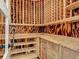 Unique wine cellar with custom wood racking, shelving, and storage for wine boxes at 1520 Stone Trl, Enterprise, FL 32725
