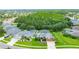 Aerial view of a beautiful home with a lush green lawn and landscaped yard in a quiet neighborhood at 1910 Creekwater Blvd, Port Orange, FL 32128