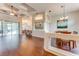 Spacious living room with wood floors, tray ceilings, and an open floor plan at 1910 Creekwater Blvd, Port Orange, FL 32128
