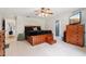 Bedroom featuring a ceiling fan, natural light, wood floors and neutral paint at 2221 Oak Hill Dr, Deland, FL 32720