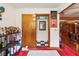 Bonus room includes shelving, white rug, and doorway at 2221 Oak Hill Dr, Deland, FL 32720