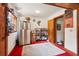 Bonus room with stainless fridge, shelving, and decor at 2221 Oak Hill Dr, Deland, FL 32720