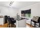 Breakfast nook featuring a black countertop, ample seating, and a window bench at 2221 Oak Hill Dr, Deland, FL 32720