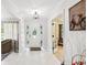 Bright foyer with decorative glass front door and neutral tones at 2221 Oak Hill Dr, Deland, FL 32720