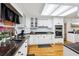 Modern kitchen with granite countertops and stainless steel appliances at 2221 Oak Hill Dr, Deland, FL 32720