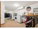 Spacious laundry room with washer, dryer, shelving and clothing racks at 2221 Oak Hill Dr, Deland, FL 32720