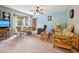 Comfortable living room with a ceiling fan and cozy decor at 2221 Oak Hill Dr, Deland, FL 32720