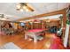 Spacious rec room with pool table and seating area for entertainment at 2221 Oak Hill Dr, Deland, FL 32720