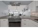 Bright kitchen with updated appliances and views of the dining and living area at 2222 Ocean Shore Blvd # 304B, Ormond Beach, FL 32176