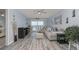 Inviting living room with ocean view, neutral furniture, and coastal decor at 2222 Ocean Shore Blvd # 304B, Ormond Beach, FL 32176