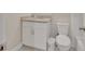 Bathroom with single sink vanity with granite countertops and white cabinetry at 241 Bayou Vista St, Debary, FL 32713