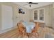 Bright dining area featuring wood floors and backyard access at 241 Bayou Vista St, Debary, FL 32713