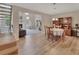 Open floor plan featuring living, dining, and kitchen spaces, great for entertaining at 241 Bayou Vista St, Debary, FL 32713
