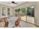 Cozy dining area with a view of the deck and backyard at 241 Bayou Vista St, Debary, FL 32713