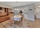 Inviting dining area featuring a view into the bright kitchen, perfect for entertaining at 241 Bayou Vista St, Debary, FL 32713