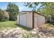Exterior view of detached garage with roll up door at 241 Bayou Vista St, Debary, FL 32713