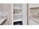 The pantry is neatly arranged with storage containers and shelves for organizing kitchen essentials at 241 Bayou Vista St, Debary, FL 32713