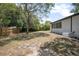 Backyard view shows a grassy space ready for a new owner's creative ideas at 2434 Barbarossa Ave, Deltona, FL 32738