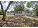 Spacious backyard with mature trees offering nice shade at 2434 Barbarossa Ave, Deltona, FL 32738