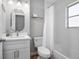 Updated bathroom featuring a new vanity and tub-shower combination at 2434 Barbarossa Ave, Deltona, FL 32738