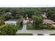 Aerial view of property featuring mature trees and a serene location at 2509 Kumquat Dr, Edgewater, FL 32141