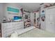 Bright bedroom showcasing a large dresser, decorative accents, and functional layout at 2509 Kumquat Dr, Edgewater, FL 32141