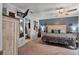 Comfortable main bedroom with a ceiling fan, ensuite bathroom, and closet space at 2509 Kumquat Dr, Edgewater, FL 32141
