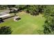 Lush green lawn area with a small, well-maintained shed offering ample space for outdoor activities at 2699 Audubon Ave, Deland, FL 32720