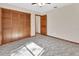 Bedroom featuring natural light, wood trim and a double door closet for ample storage at 2699 Audubon Ave, Deland, FL 32720