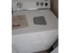 Close-up view of a white Whirlpool dryer in the laundry room at 272 Sunrise Blvd, Debary, FL 32713