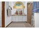 Bathroom featuring a large mirror, vanity with storage, and a tiled shower stall at 2885 Newmark Dr, Deltona, FL 32738