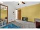 Bedroom with ample natural light, bed, and closet with mirrored doors at 2885 Newmark Dr, Deltona, FL 32738