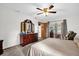 Bedroom with a queen bed, dresser, and access to the patio area at 2885 Newmark Dr, Deltona, FL 32738