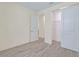 Bedroom with wood floors, closet and bright natural light at 2894 Hardy Ave, New Smyrna Beach, FL 32168