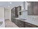 Modern kitchen showcasing granite countertops, stainless steel appliances, and an eat-in bar for a gourmet experience at 2894 Hardy Ave, New Smyrna Beach, FL 32168