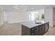 Bright and open kitchen space with a large island, perfect for entertaining and modern living with seamless transitions at 2894 Hardy Ave, New Smyrna Beach, FL 32168