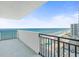 Balcony view shows ocean view and overlooks the beach, oceanfront pool and coastline below at 2987 S Atlantic Ave # 903, Daytona Beach, FL 32118