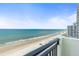 Bright balcony view overlooking the ocean, beach and next door condo tower at 2987 S Atlantic Ave # 903, Daytona Beach, FL 32118