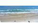 Panoramic beach view with the ocean and beachgoers at 2987 S Atlantic Ave # 903, Daytona Beach, FL 32118