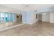 Expansive living room with a mirror wall reflecting ocean views at 2987 S Atlantic Ave # 903, Daytona Beach, FL 32118