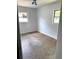 Bedroom features natural light with a classic ceiling light fixture and neutral walls at 3 Cassia Ln, Debary, FL 32713