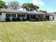 Landscaped front yard view of a one-story home at 3 Cassia Ln, Debary, FL 32713