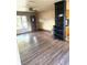 Open floorplan living area with hardwood floors and a ceiling fan at 3 Cassia Ln, Debary, FL 32713