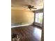 Living room with hardwood flooring and two windows at 3 Cassia Ln, Debary, FL 32713