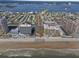 Aerial view of the property, showing parking and beach access at 3267 S Peninsula Dr, Daytona Beach, FL 32118